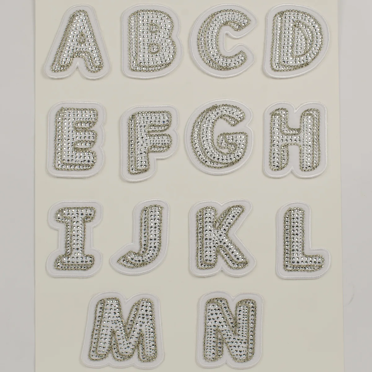 White embroidered sew-on crystal letters