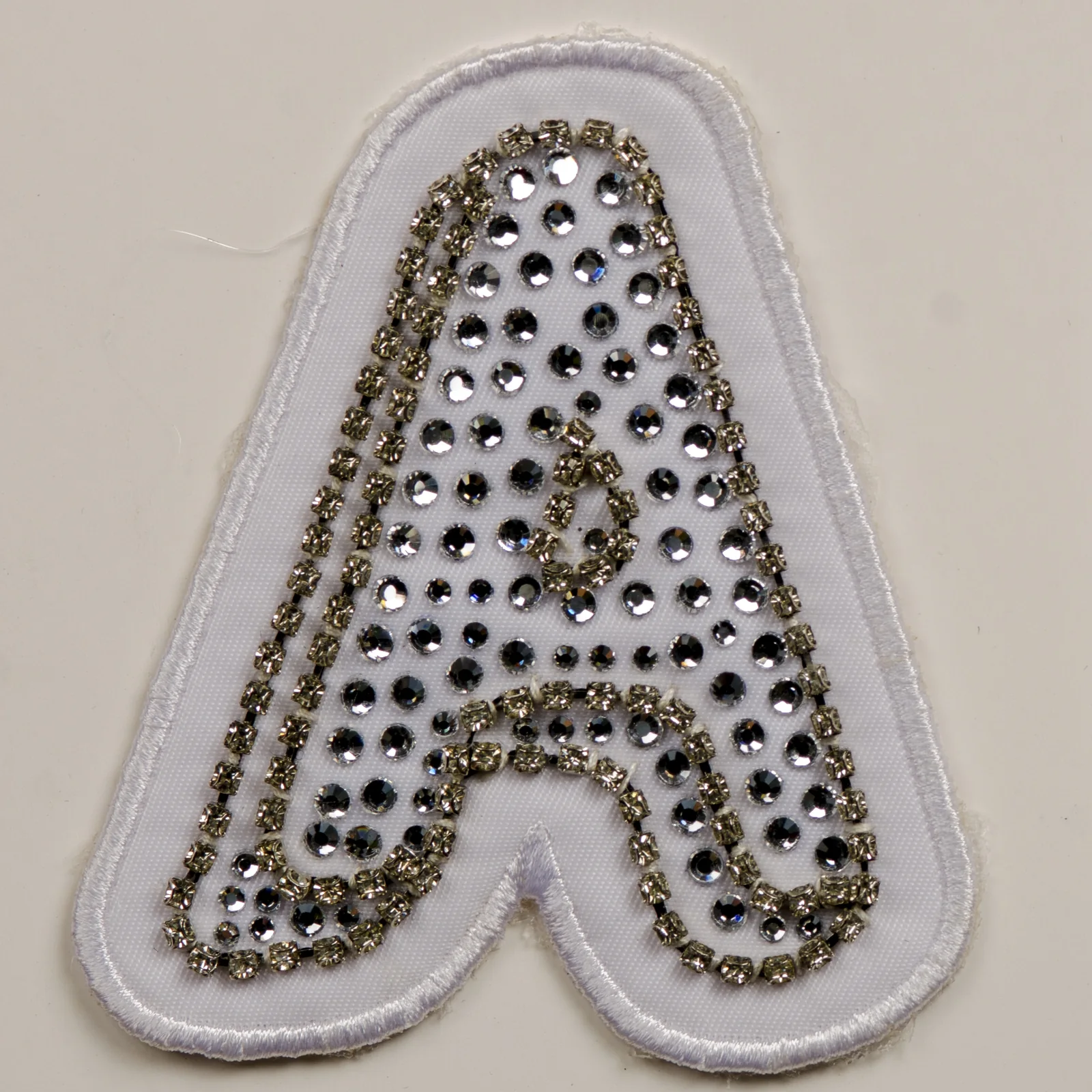 White embroidered sew-on crystal initial A patch