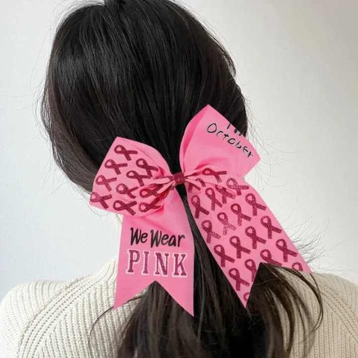 Pink ribbon bow hair tie