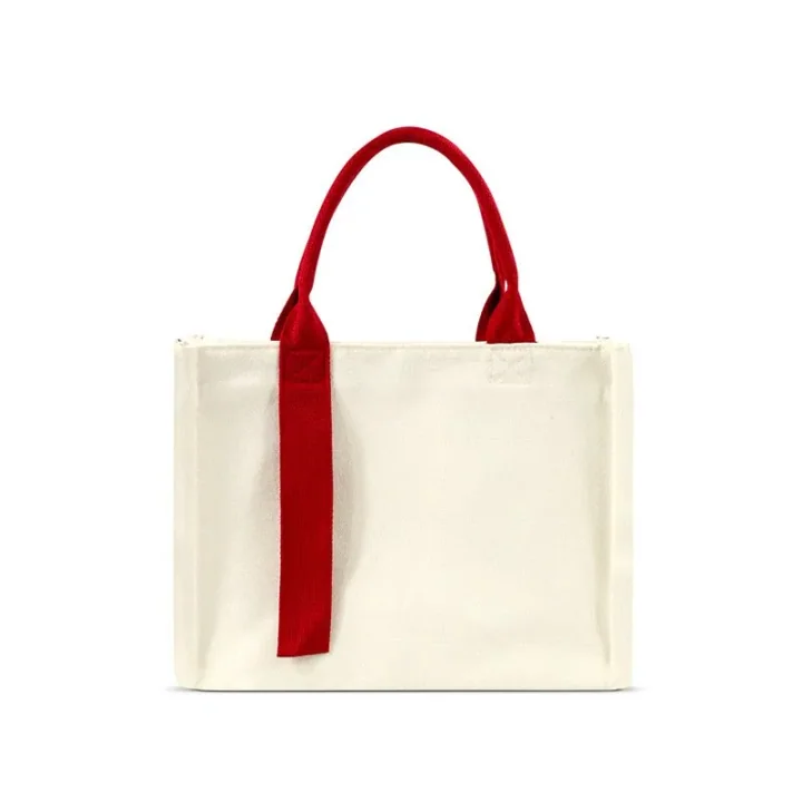 Structured canvas tote bag with accent strap