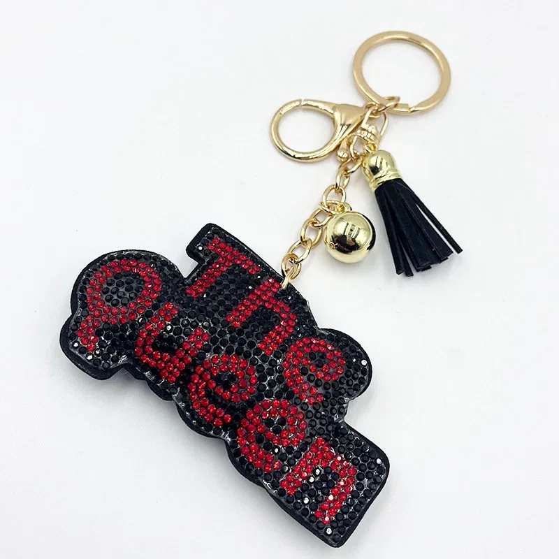 The Queen Rhinestone Keychain with Tassel – 3.9 in (W) × 2.8 in (H)