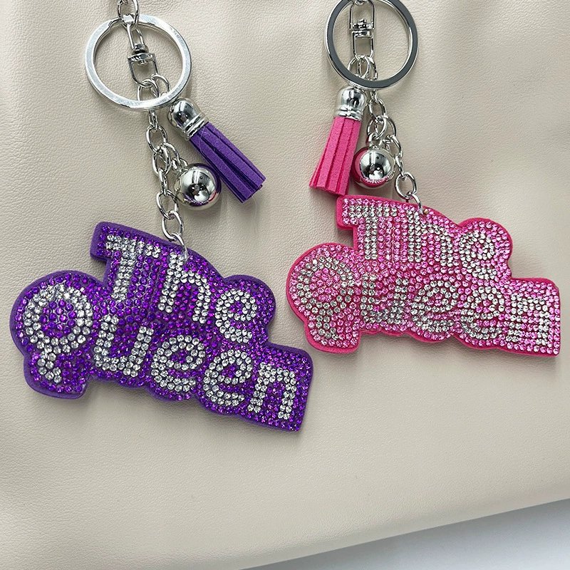 The Queen” Rhinestone Keychain with Tassel — Sparkling Fashion Bag Charm for Women